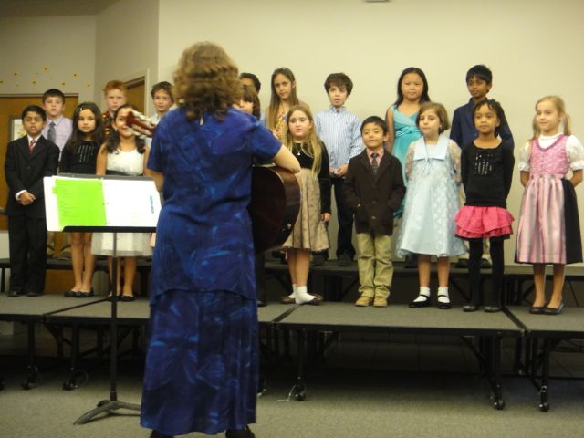 Doubtful she'll ever be a famous singer to the world, but to these children, she is a rockstar. rockstar