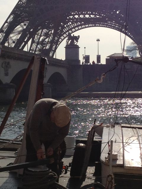 but this guy...not a tourist..does he comprehend where he mends things? Paris boats