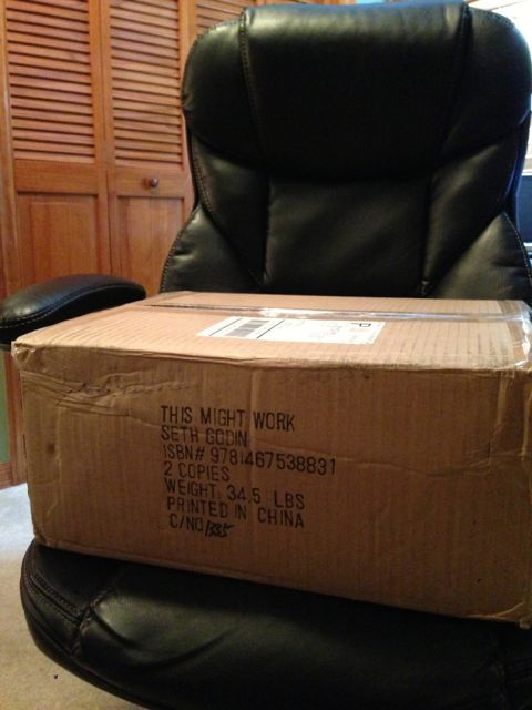 photo of package from China sitting on desk chair in Orlando