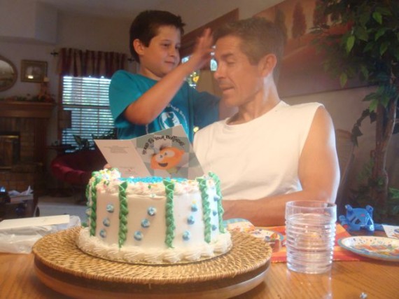 Dad and Son enjoying special moments at birthday party