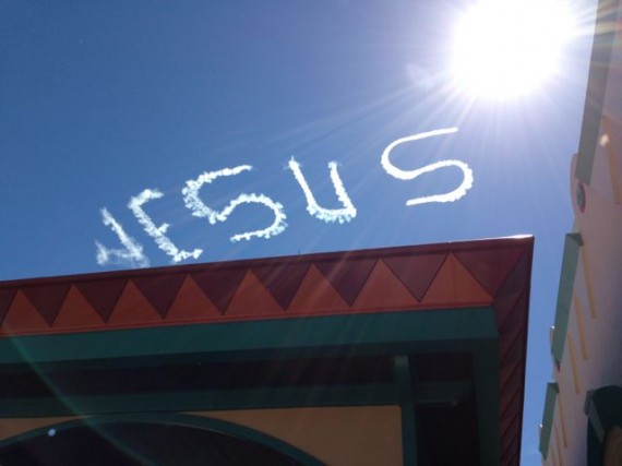 Sky writing plane writing Jesus