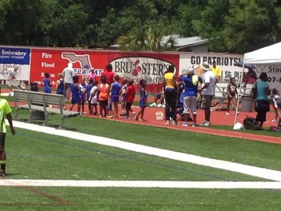 Bantam Long Jumpers waiting in line to jump