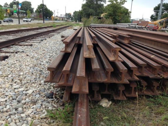 Pile of train track rails
