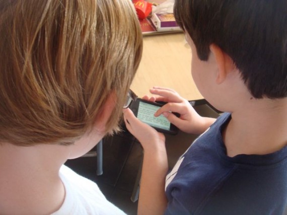 Two boys with iPhone
