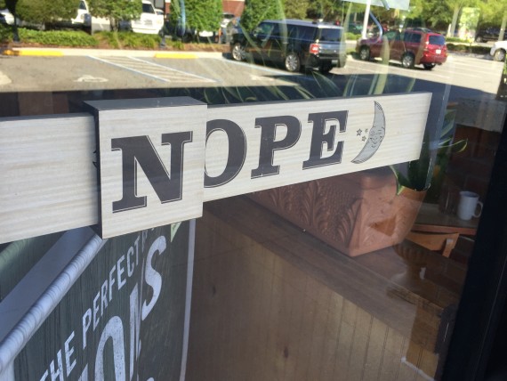 Clever Closed sign on shop door