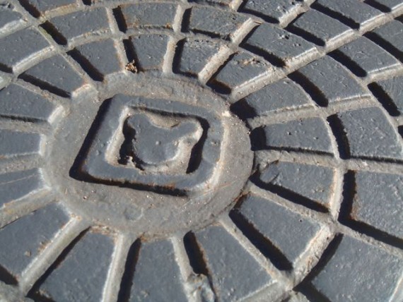 Disney Storm drain cover with hidden Mickey
