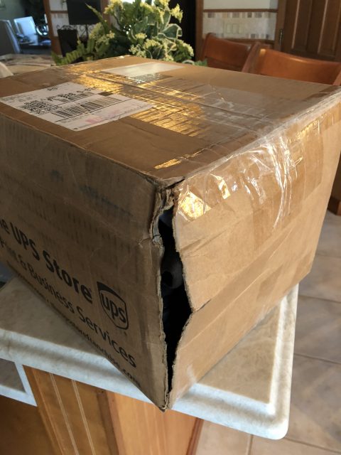 damaged UPS box