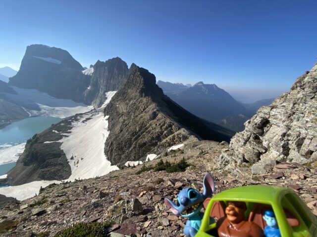 Disney character toys in mountain setting