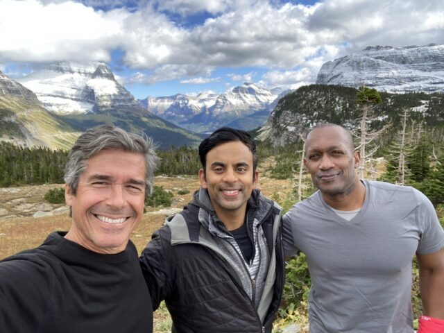 three hikers in the mountains