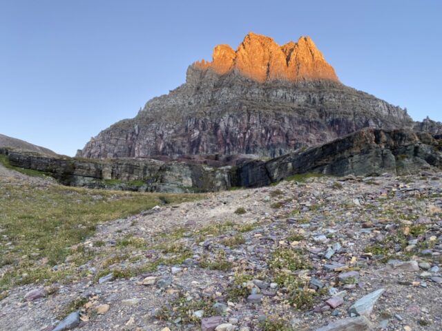 Mountain with sunrise sunlight hitting mountain top