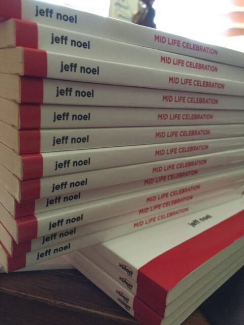 Stack of the book Mid Life Celebration