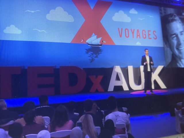 TEDx Talk man on stage