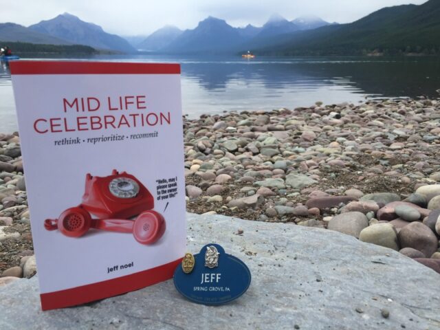 book mid Life Celebration by a lake
