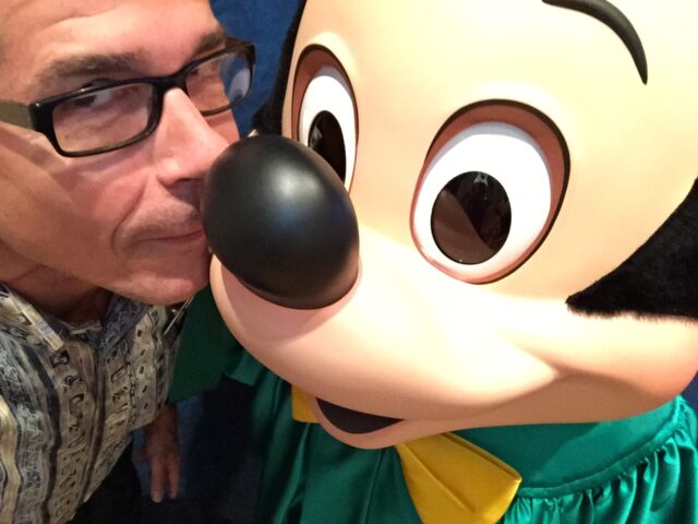 Disney Speaker Jeff Noel nose to nose with Mickey Mouse