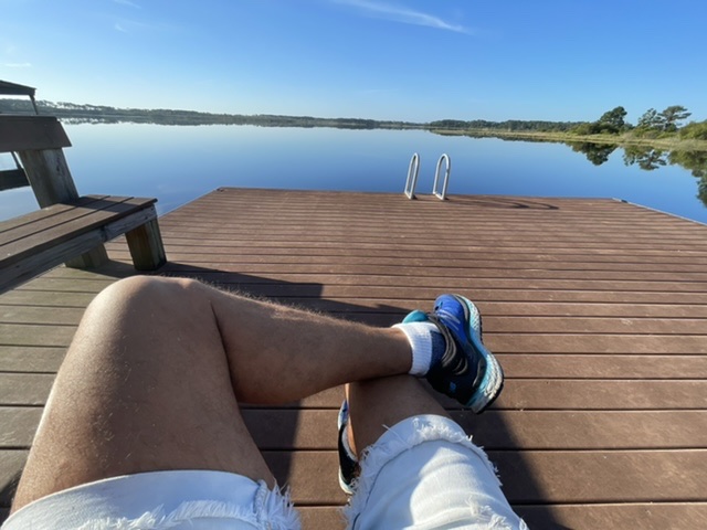 lake view from man's lap perspective