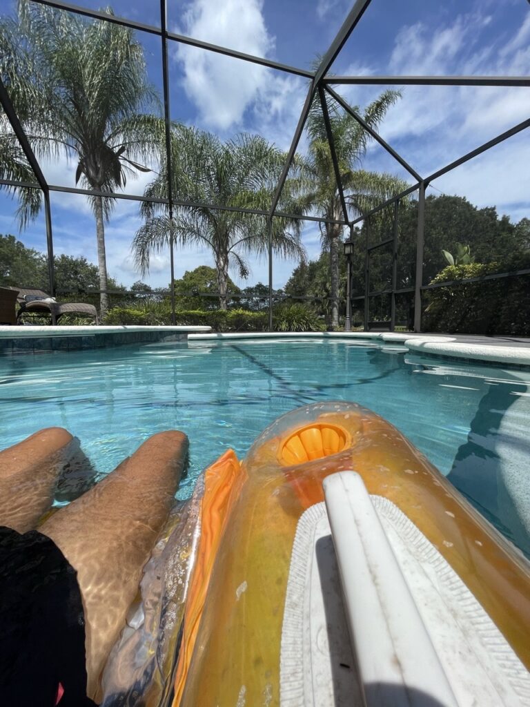 man on pool float