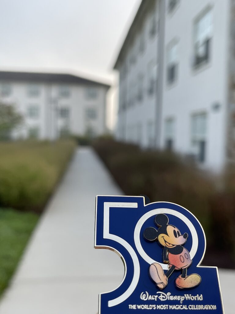 Disney 50 year pin and college dorm