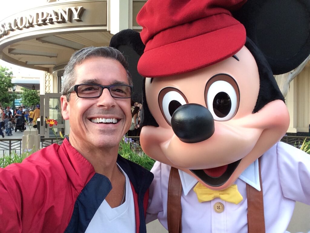 Disney Keynote Speaker Jeff Noel with Mickey Mouse