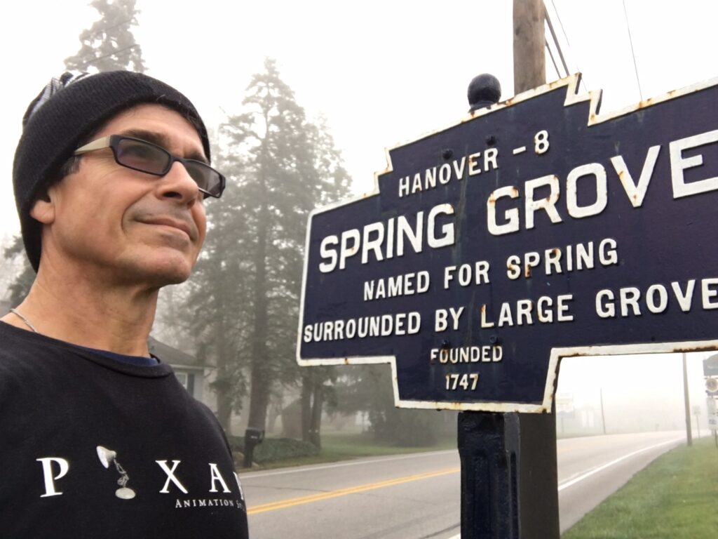 Disney Speaker Jeff Noel at his hometown sign