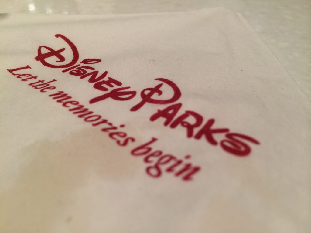Disney Parks napkin logo