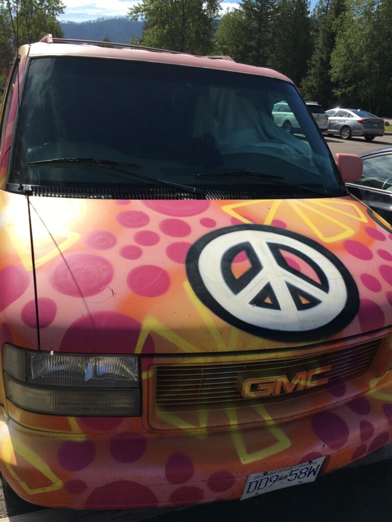 car with peace sign