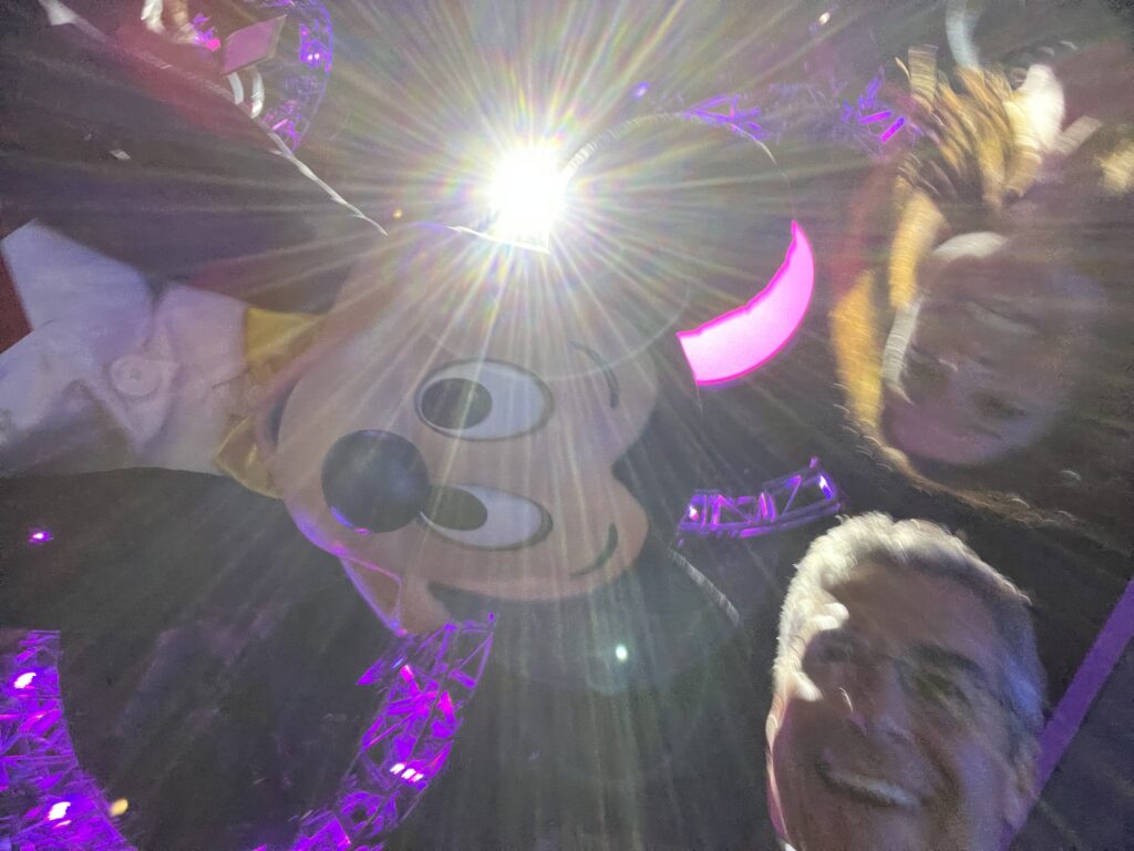 two people with Mickey Mouse