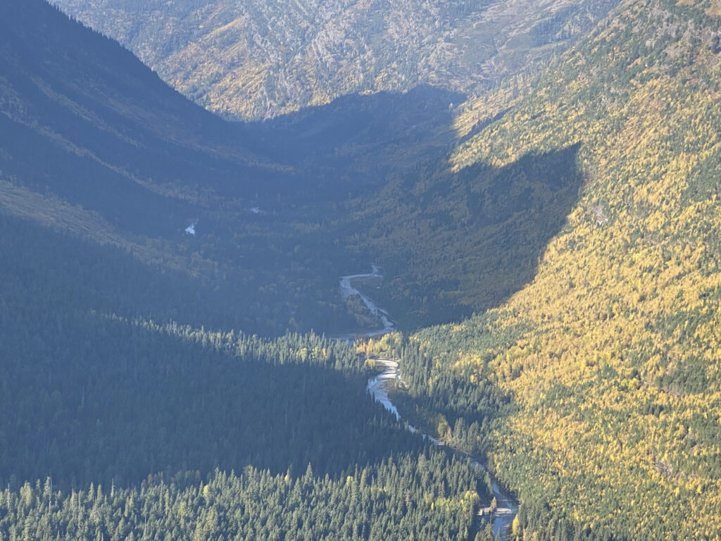 mountain shadow on a mountain valley floor