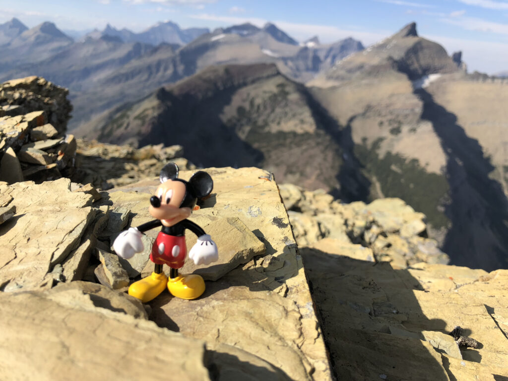 mountains with small Disney toy