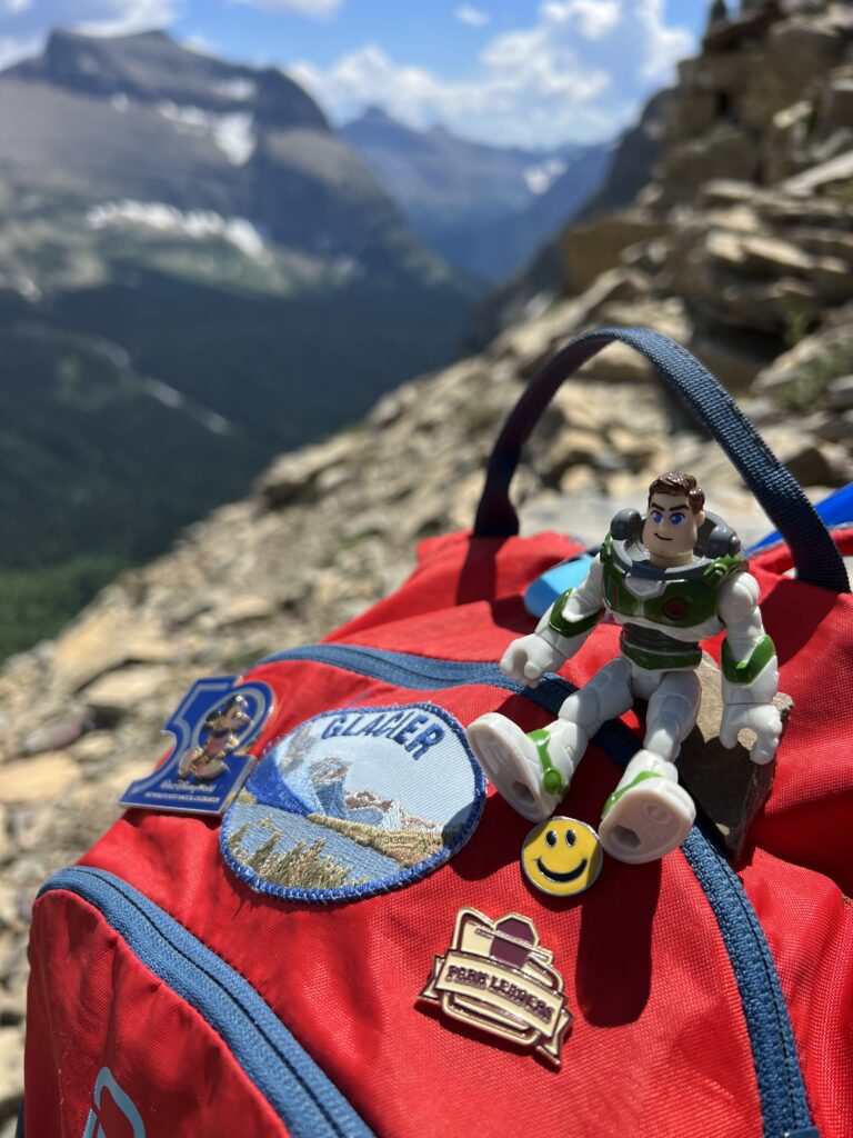 Red backpack in the mountains
