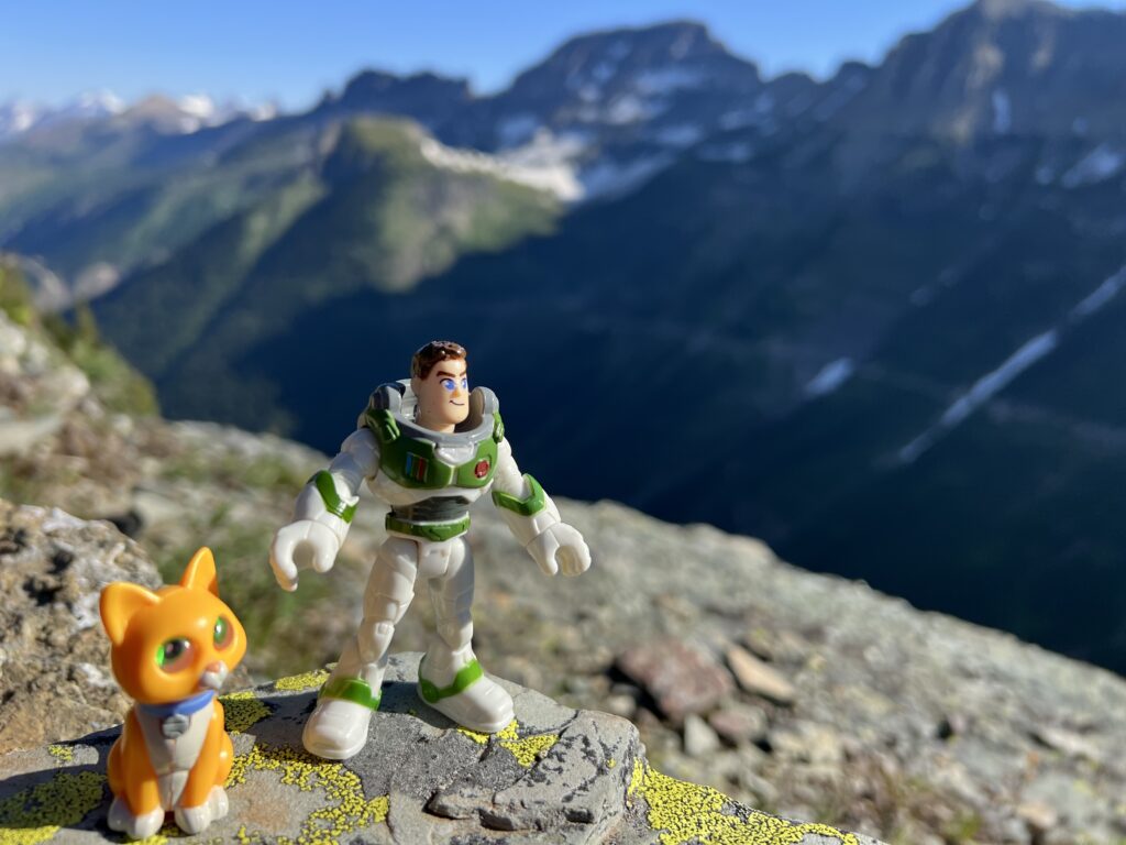 Small Disney character toys in the mountains