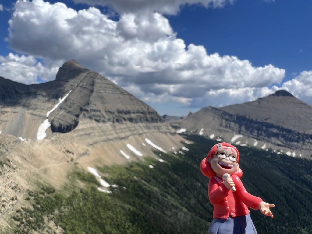 Disney figurine in the mountains